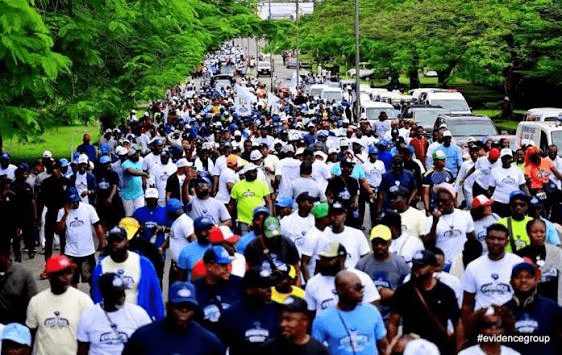 Aerial view of thousands of youths marching